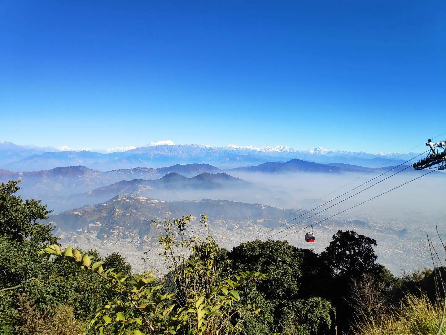 Snow peaks of the Himalaya seen from the top of Chandragiri hill.