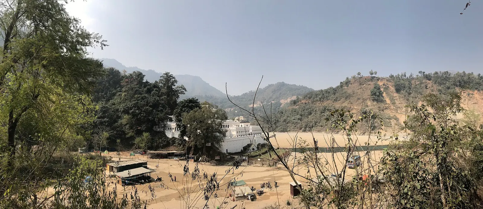 A sandy riverbank and wooded hills near Rani Mahal on the Kali Gandaki in Palpa.